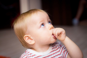 Baby Sucking Their Thumb